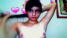 Skinny teen fucking herself topless on webcam