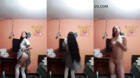 Hot chick dancing in her uniform, showing off her pussy