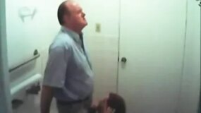 Sucking the teacher's cock in the school bathroom